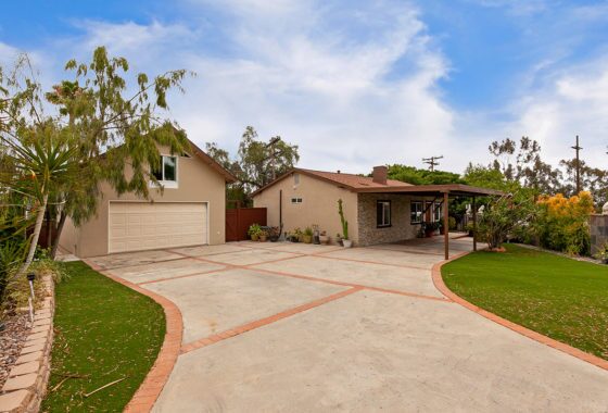 large front driveway with views garage and house