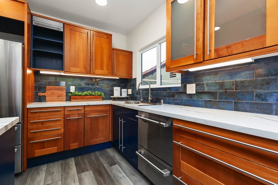 2619 Montclair St - Closer Look of the Kitchen Area with a Blue Tile Backsplash and Lots of Storage