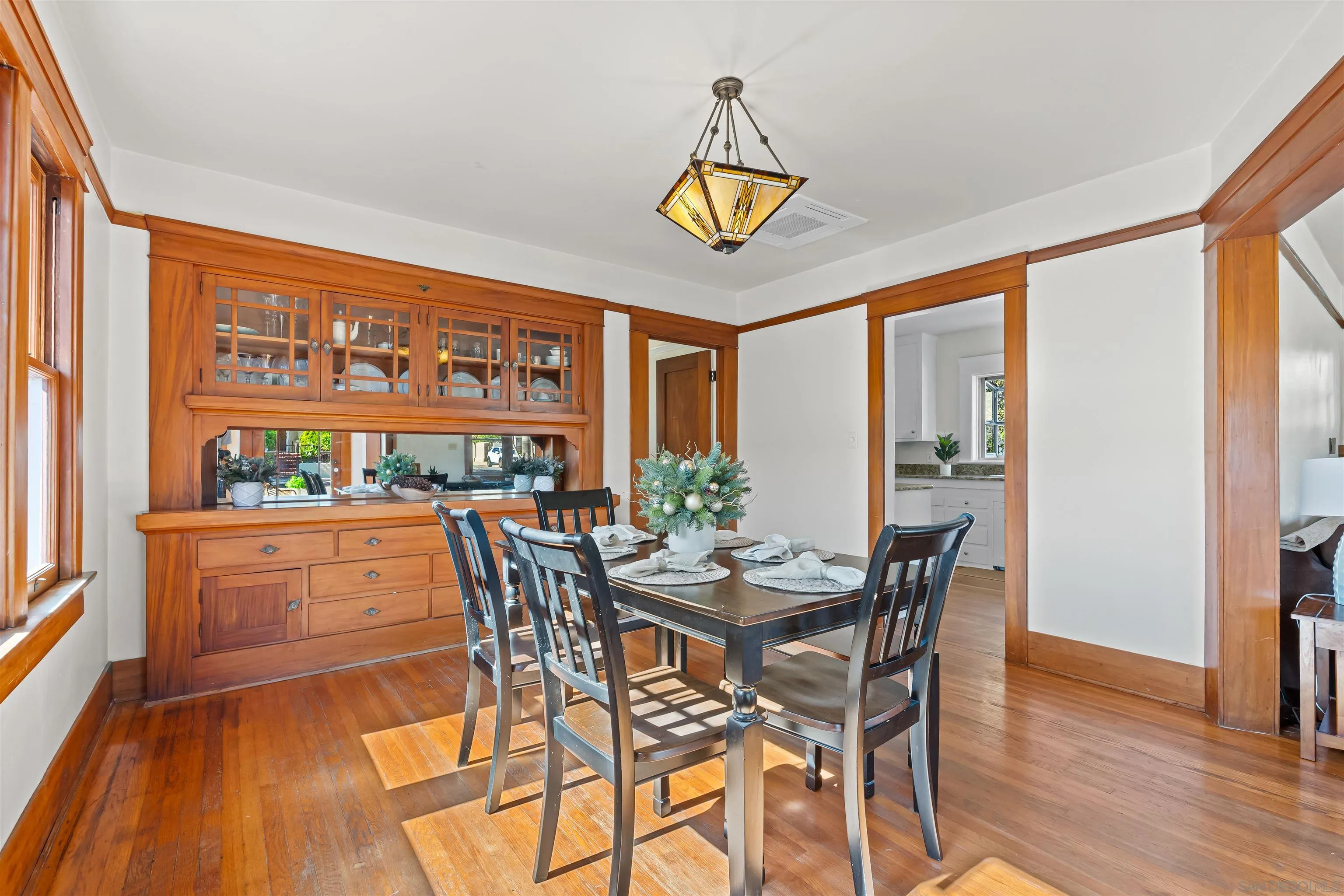 Charming SINGLE-STORY SWISS CHALET CRAFTSMAN on a CORNER LOT in coveted NORTH MISSION HILLS! HISTORIC HOME Protected Under THE MILLS ACT, offering SIGNIFICANT PROPERTY TAX SAVINGS. Original GUMWOOD Built-Ins, HARDWOOD Floors, and CLASSIC ARCHITECTURAL DETAILS. Light and Bright with LARGE WINDOWS. UPGRADED BATHROOM, and a NEW 4-WAY SPLIT A/C & HEATING SYSTEM for ZONED COOLING. Spacious COVERED PORCH Perfect for Morning Coffee. Detached 1-Car Garage and WALKING DISTANCE TO SHOPS, CAFÉS, BOUTIQUES, AND TOP (public and private) SCHOOLS!