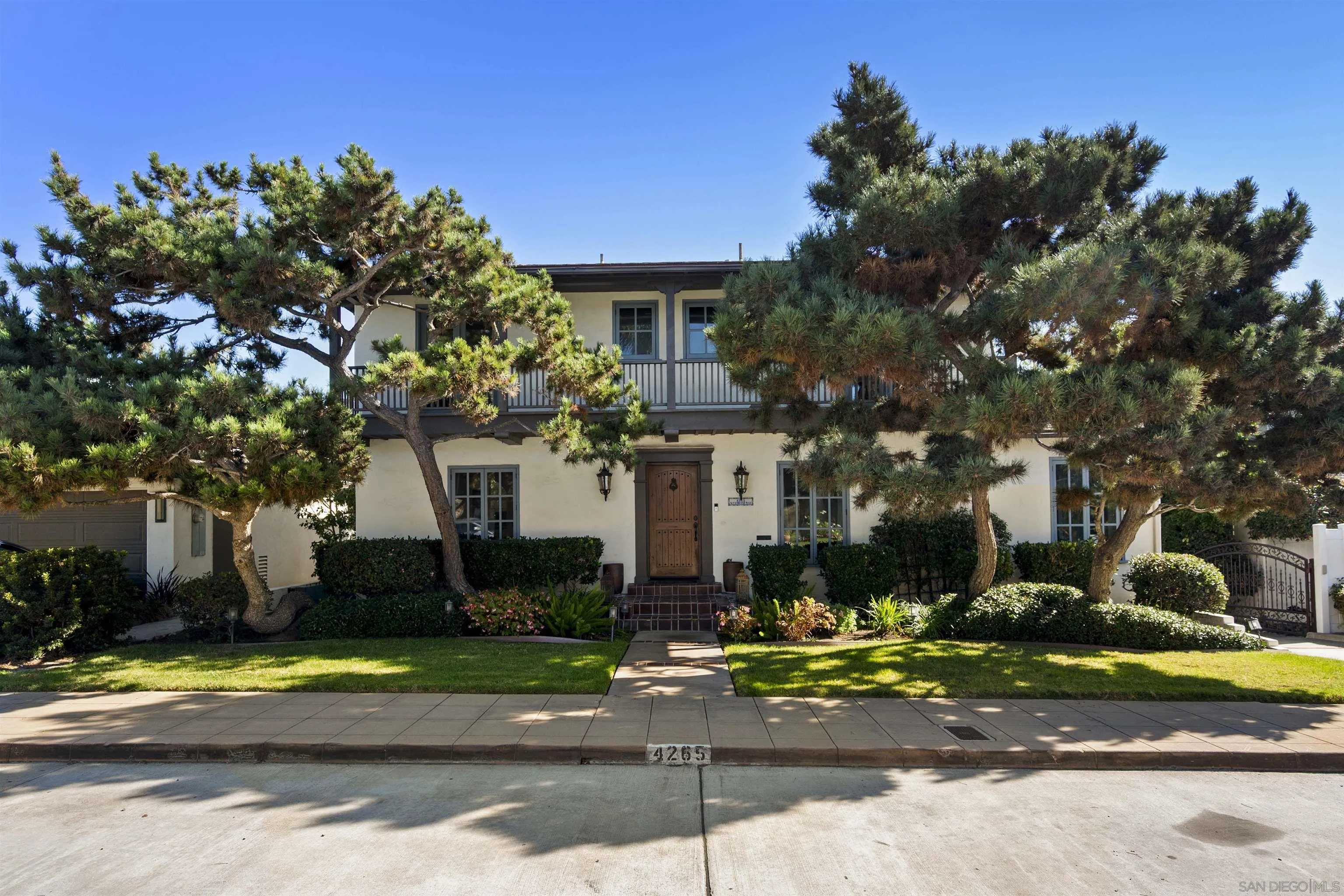 Nestled on a peaceful, no-through street, this beautiful Spanish-style home offers timeless character, unbeatable location, and endless potential. Just minutes from major freeways (8, 163, and 5) and within walking distance to local favorites—coffee shops, grocery stores, parks, restaurants, and bars—this home combines serene living with city convenience.  Originally a 4-bedroom home, it’s currently configured as a spacious 3-bedroom but can easily be converted back to its original layout. Permits for renovations have been submitted to the city, providing a rare opportunity to personalize and expand this classic property while preserving its authentic charm.  Enjoy the quiet, tree-lined street and the best of San Diego living in one of its most desirable neighborhoods.