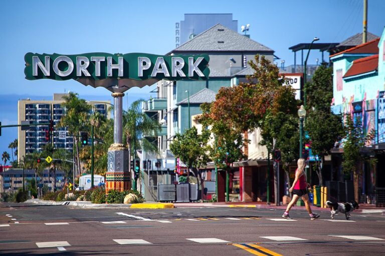 North Park neighborhood sign with pedestrians in San Diego